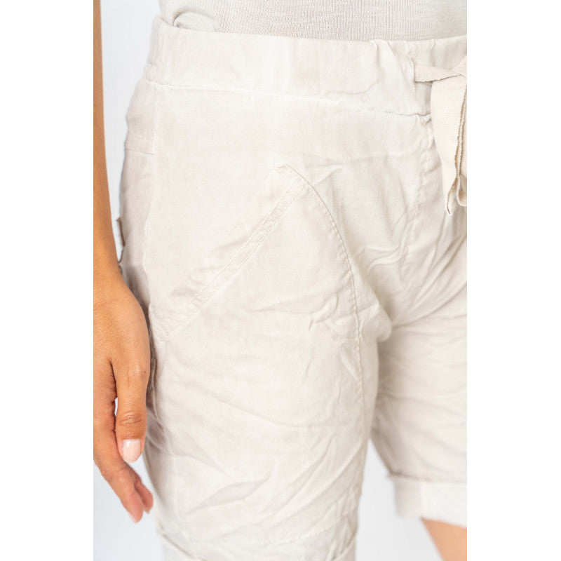 Flat pocket Mid Thigh Short